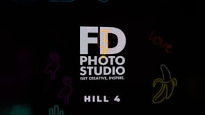 Video Gallery - Corner Stage with Jungle wall and a Vespa-style scooter for rent