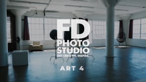 Video Gallery - A corner studio with dark wood paneling, wooden blinds, and a sprawling 8-foot marquee star.