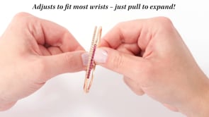 .70 ct. t.w. Ruby and .60 ct. t.w. Diamond Wrap Bracelet in 18kt Rose Gold. 7"