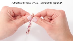 2.50 ct. t.w. Ruby and .52 ct. t.w. Diamond Wrap Bracelet in 18kt Rose Gold. 7"