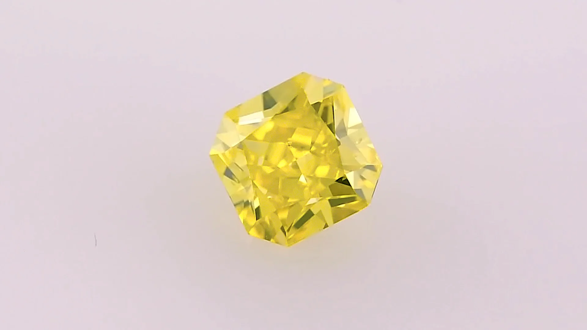 1.23 CTTW GIA Certified Fancy Intense Yellow Diamond Three