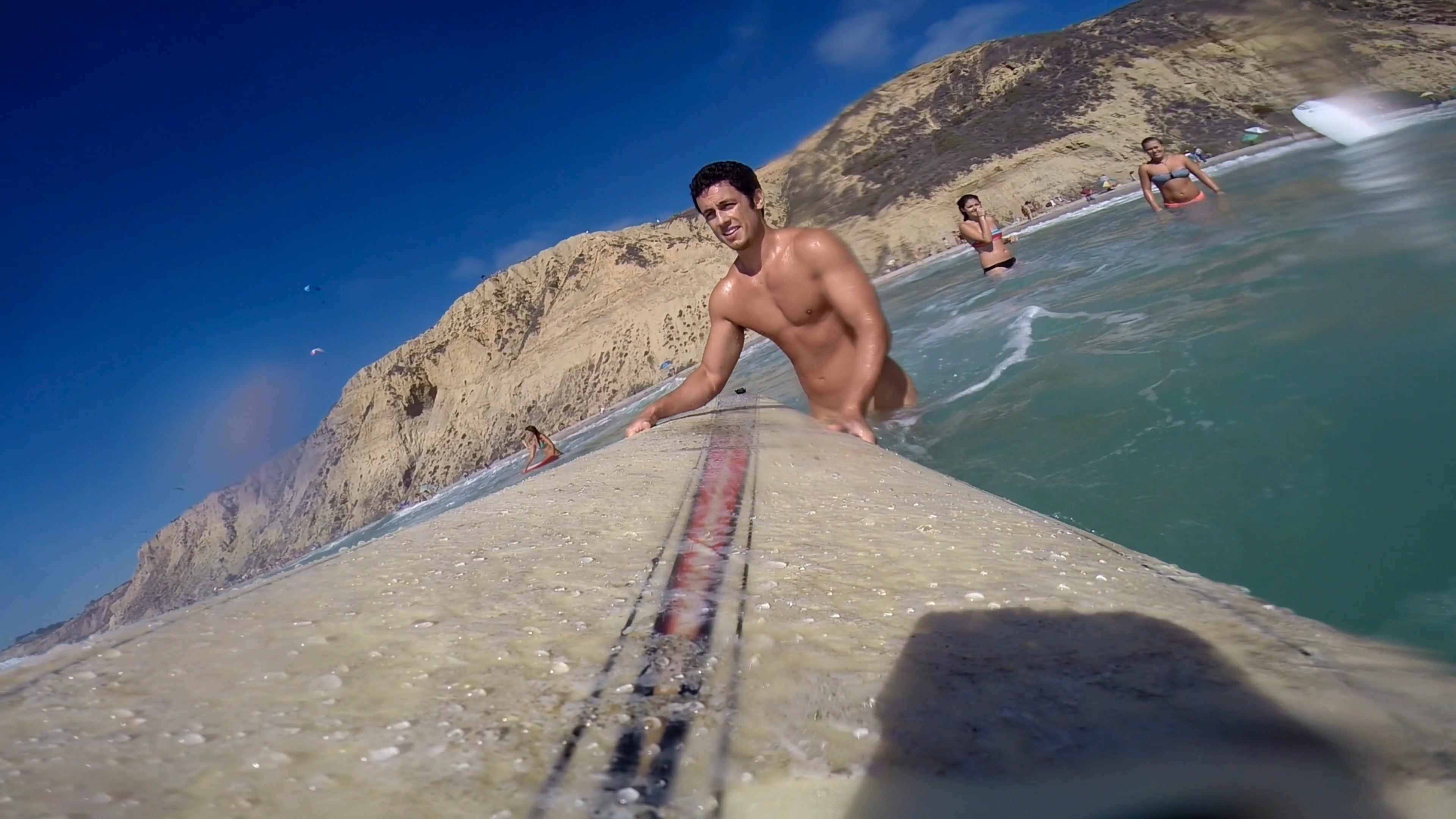 Surfing at nude beach