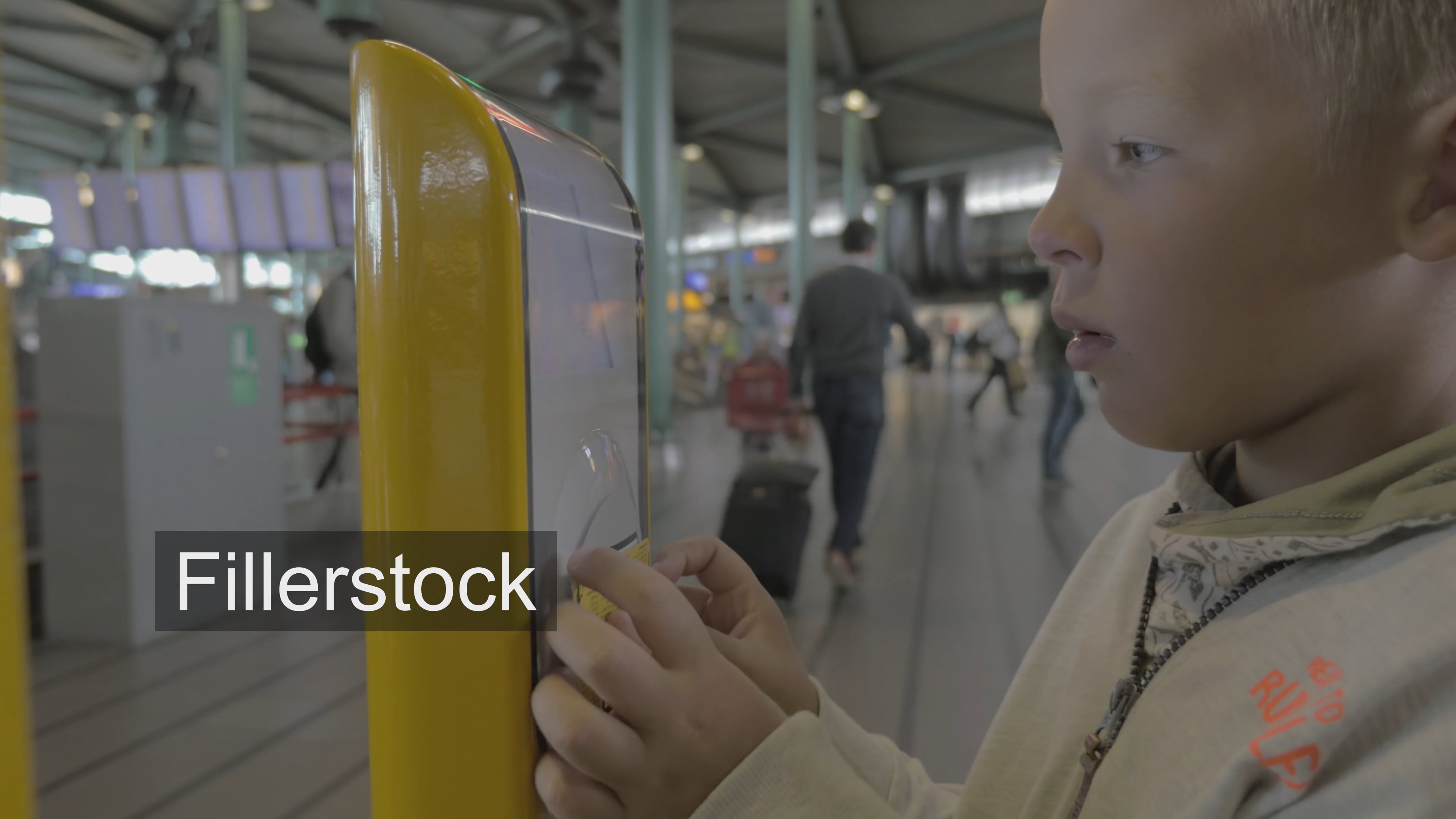 Child using ticket scanning machine on Vimeo